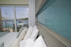 115 The Strand Hotel and Suites